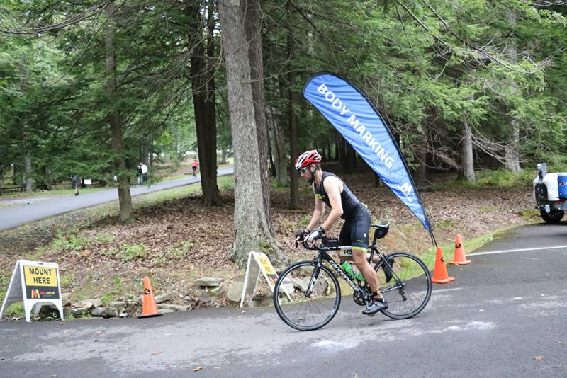 SavageMan Triathlon Biker Biker in SavageMan Triathlon at Deep Creek Lake